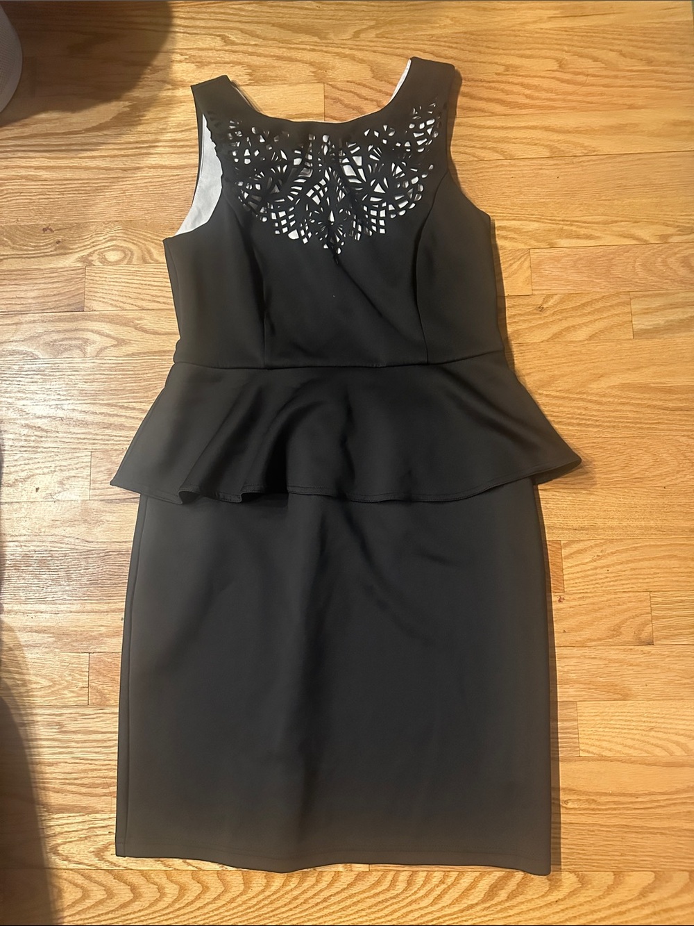 Spense Black Sleeveless Peplum Midi Dress with Laser-Cut Neckline